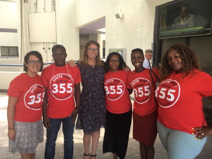 Workers with UNITE HERE Local 355 in South Florida celebrate new protections in the city of Miami Beach