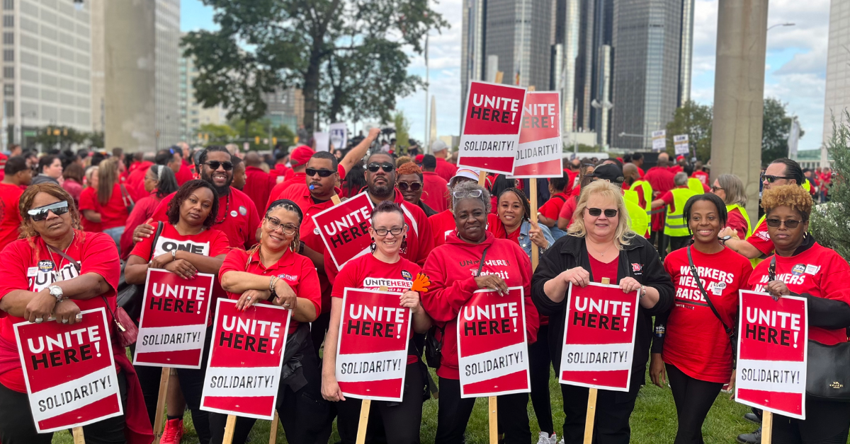 UNITE HERE Local 24 members with Solidarity picket signs at a UAW rally in Detroit.
